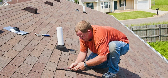 Mac Johnson Roofer performing a detailed honest roof inspection.